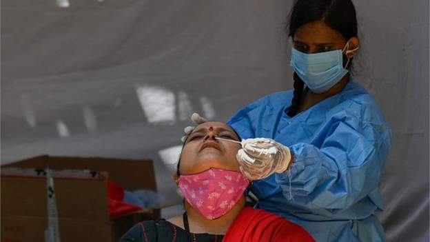 Над 386 хиляди нови случая на коронавирус през последното денонощие в Индия – снимки, видео